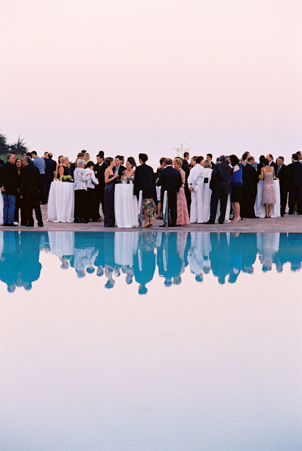 pool side wedding reception photo by Yvette Roman Photography